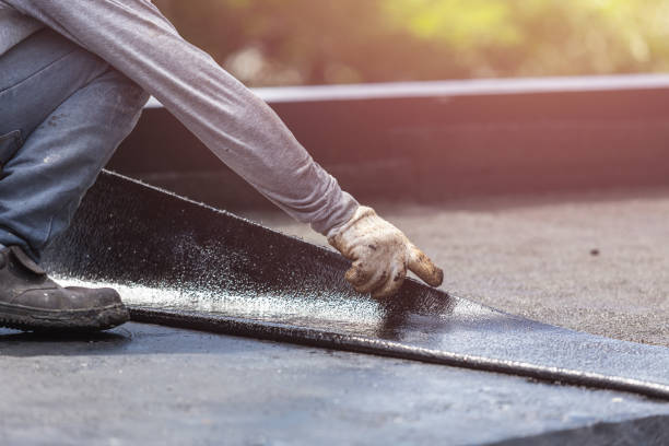 Professional Waterproofing technician working in Adrian, MI